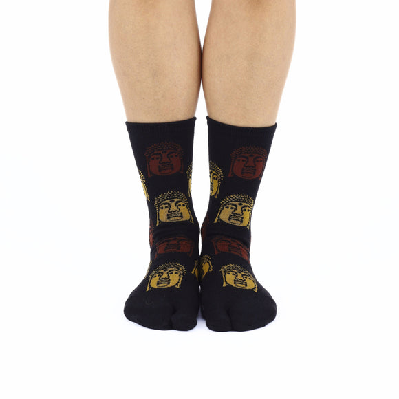 Person wearing long black Tabi Socks " Nara Daibutsu ", right side view