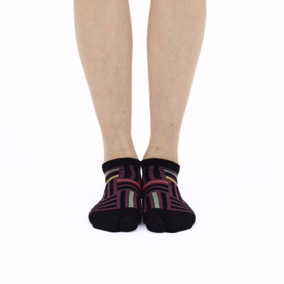 Person wearing short black Tabi Socks " Sankuzushi ", front view