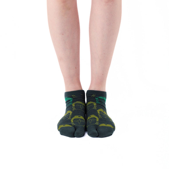 Person wearing short green Tabi Socks " Kamakura Daibutsu ", front view