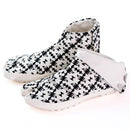 Angled top-down view of black Tabi Shoes "TIGRE"
