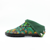 Left side of green Tabi Shoes 