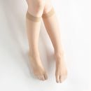 Person wearing Tabi-style stockings " ＆TABI ", right side view