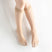 Person wearing Tabi-style stockings " ＆TABI ", right side view