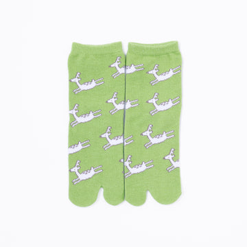 Front view of long green Tabi Socks " Shika Origami "– children's size