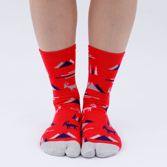 Person wearing long red Tabi Socks " Mikasayama ", front view