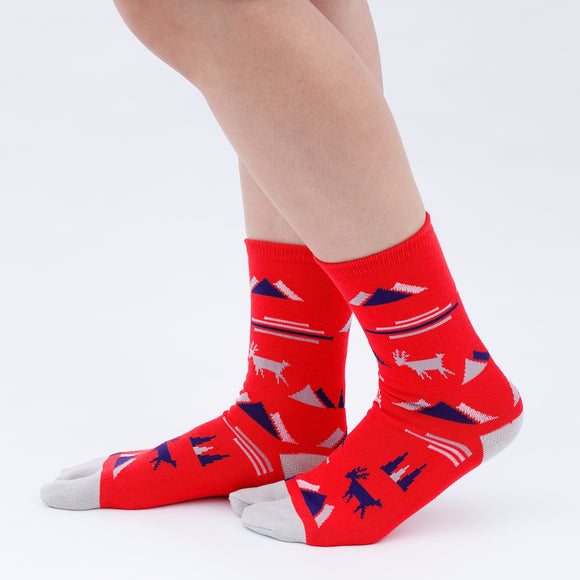 Person wearing long red Tabi Socks " Mikasayama ", right side view
