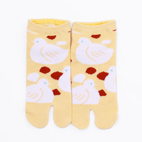 Front view of short yellow Tabi Socks " Hato"