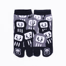 Front view of short black Tabi Socks "Daruma"