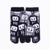 Front view of short black Tabi Socks "Daruma"