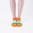 Person wearing short orange Tabi Socks " Densha ", front view