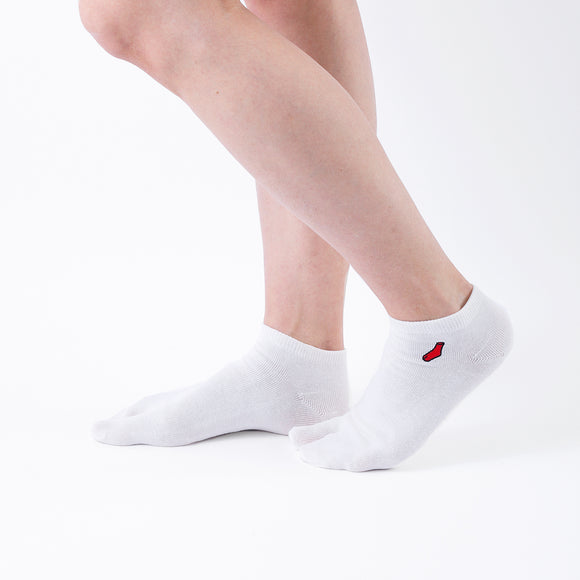 Person wearing short white Tabi Socks "TABI-JI", right side view