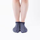 Person wearing short navy Tabi Socks " Hyoshigi ", front view