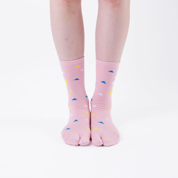 Person wearing long pink Tabi Socks " Surfer ", front view
