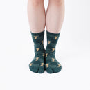Person wearing long green Tabi Socks " Shika Nozoku ", front view