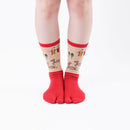Person wearing long red Tabi Socks " Nara-e ", front view